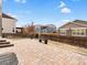 Paver patio in a fenced backyard, ideal for entertaining and outdoor activities at 353 Zuniga St, Brighton, CO 80601