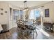 Dining room with a table, chairs, and sliding glass doors leading to the outside at 353 Zuniga St, Brighton, CO 80601