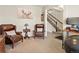 Comfortable living room with neutral color palette, cozy seating, and a homey design at 353 Zuniga St, Brighton, CO 80601