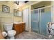 Basement bathroom with shower stall, toilet and vanity at 2730 N Columbine St, Denver, CO 80205