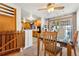 Bright dining area with wood floors and access to the kitchen at 2730 N Columbine St, Denver, CO 80205