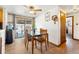 Dining area with glass-top table and sliding door to backyard at 2730 N Columbine St, Denver, CO 80205
