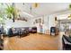 Living room with hardwood floors, sectional sofa, and entertainment center at 2730 N Columbine St, Denver, CO 80205
