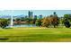 Scenic park view with lake, fountain, and Denver skyline in the background at 2730 N Columbine St, Denver, CO 80205