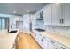 Modern kitchen featuring white cabinetry, a center island, and stainless steel appliances at 39555 Gwinett Cir, Elizabeth, CO 80107