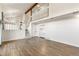 Open-concept living space featuring stairs leading to the second floor, adjacent to the kitchen at 3915 E Jamison Pl, Centennial, CO 80122