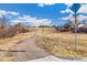 Gravel walking path with neighborhood views and a serene, natural setting at 3915 E Jamison Pl, Centennial, CO 80122