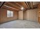 Unfinished basement with a window, offering natural light and ventilation; ready for customization and expansion at 10836 W Evans Ave # 32, Lakewood, CO 80227