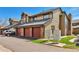 Multi-Gathering home shows garages and mailboxes, with an emphasis on unit 32 at 10836 W Evans Ave # 32, Lakewood, CO 80227
