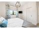 Bedroom with a queen bed and sliding door closet at 30796 Burland Rd, Golden, CO 80403