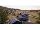 Dark modern home situated on a lush lot with picturesque views and a detached two car garage at 30796 Burland Rd, Golden, CO 80403