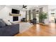 Spacious living room featuring a fireplace and hardwood floors at 30796 Burland Rd, Golden, CO 80403