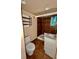 Cozy bathroom featuring tile floors, toilet, shower, and vanity at 2835 Cherry St, Denver, CO 80207