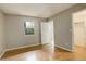 A view of a bedroom with a closet and a window for natural light at 3550 S Harlan St # 259, Denver, CO 80235