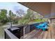 Community deck with picnic tables offers beautiful fountain and pond views at 3550 S Harlan St # 259, Denver, CO 80235