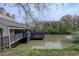 Exterior shot of the neighborhood pond with a wooden deck and adjacent buildings at 3550 S Harlan St # 259, Denver, CO 80235