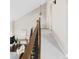 Light filled hallway with contemporary decor and neutral tones at 6775 W Yale Ave, Lakewood, CO 80227