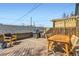 Inviting deck with outdoor seating, a grill, and stylish decor, perfect for outdoor gatherings at 2163 S Grant St, Denver, CO 80210