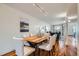 Well-lit dining room with hardwood floors, comfortable seating, and inviting atmosphere at 2163 S Grant St, Denver, CO 80210