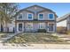 Well-maintained two-story home with a neat front yard and curb appeal at 2163 S Grant St, Denver, CO 80210