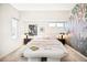 Inviting main bedroom features artistic wallpaper, plush carpet, and a soothing color palette at 2659 S Cherokee St, Denver, CO 80223