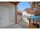 Private backyard featuring a small playhouse and low-maintenance gravel landscaping at 1172 S Zeno Way # F, Aurora, CO 80017
