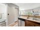 Modern kitchen design with granite countertops and stainless steel appliances at 1172 S Zeno Way # F, Aurora, CO 80017