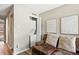 Conveniently located laundry area adjacent to a comfortable seating space at 1172 S Zeno Way # F, Aurora, CO 80017