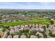 Sprawling community features lush green golf courses and serene water features at 6542 S Tempe St, Aurora, CO 80016