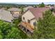 Two-story home featuring a wood deck and stunning elevated view of the surrounding neighborhood at 6542 S Tempe St, Aurora, CO 80016