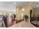 Open foyer with a view to the living areas, featuring hardwood floors at 6542 S Tempe St, Aurora, CO 80016