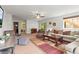 Large living room with plush seating and a walkout to the outside, perfect for relaxing at 6542 S Tempe St, Aurora, CO 80016