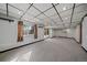 Finished basement with neutral carpet, recessed lighting and a walk-out to the yard at 8072 Windwood Way, Parker, CO 80134