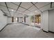 Large finished basement featuring a walk-out to the yard and neutral finishes at 8072 Windwood Way, Parker, CO 80134