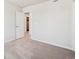 Bright bedroom with neutral walls, plush carpet, and ample natural light at 2169 Flower Blossom Ave, Brighton, CO 80601