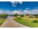 Scenic community playground area with walking path and open green space, perfect for outdoor fun at 6777 S Old Hammer Ct, Aurora, CO 80016
