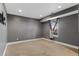 Finished basement bedroom featuring neutral walls and carpet flooring with a bright window at 3732 S Halifax St, Aurora, CO 80013