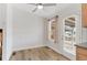 Bright dining area featuring wood-look floors and a door to the outside patio at 3732 S Halifax St, Aurora, CO 80013