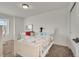 Bright bedroom with a cozy bed, white furniture, and plenty of natural light at 5251 Truckee St, Denver, CO 80249