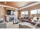 Bright living room with large windows, a fireplace, and comfortable seating for relaxation and enjoyment at 5251 Truckee St, Denver, CO 80249