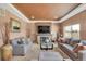 Inviting living room with a fireplace, providing a comfortable and relaxing space to unwind at 5251 Truckee St, Denver, CO 80249