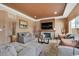 Comfortable living room featuring a fireplace, recessed lighting, and neutral-toned furnishings at 5251 Truckee St, Denver, CO 80249
