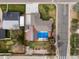 Aerial shot of a home with a private backyard pool and driveway at 2698 E Cresthill Ave, Centennial, CO 80121