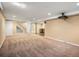 This finished basement has recessed lighting, carpet, wet bar, and potential theatre space at 2698 E Cresthill Ave, Centennial, CO 80121