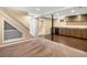Finished basement with carpet, wet bar, storage under the stairs, and plenty of space at 2698 E Cresthill Ave, Centennial, CO 80121