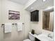 Well-maintained bathroom with a sleek vanity, shower, and contemporary accents at 2698 E Cresthill Ave, Centennial, CO 80121