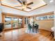 Dining room featuring hardwood floors, a dining table and sliding doors to the deck at 2698 E Cresthill Ave, Centennial, CO 80121