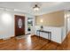 Inviting entryway with a decorative front door, hardwood floors, and neutral paint at 2698 E Cresthill Ave, Centennial, CO 80121