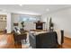 Cozy living room features a fireplace, hardwood floors, and bright natural light at 2698 E Cresthill Ave, Centennial, CO 80121