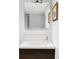 Contemporary bathroom with sleek vanity, mosaic tile backsplash, and large mirror at 11354 Allendale Dr, Arvada, CO 80004